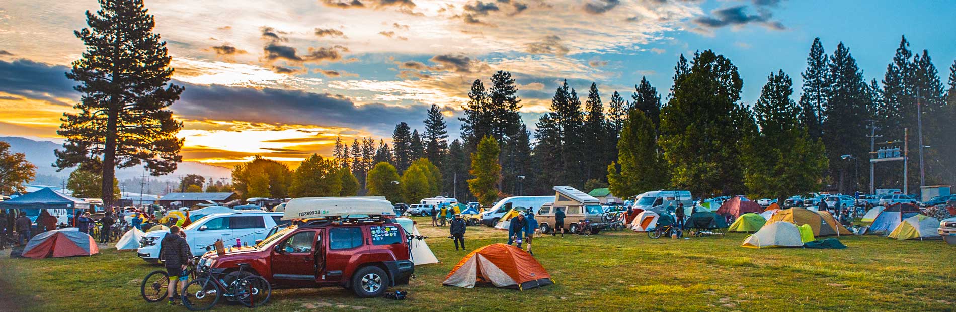 Large group of tents and people on the fetival grass