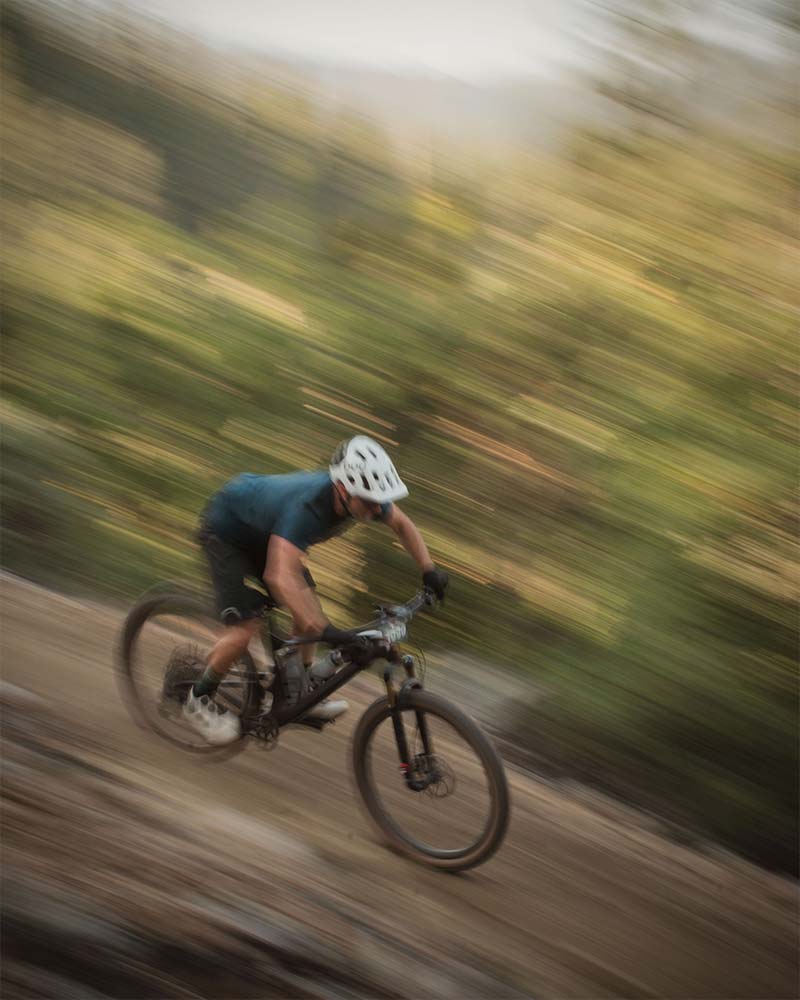 Mountain bike racer going fast